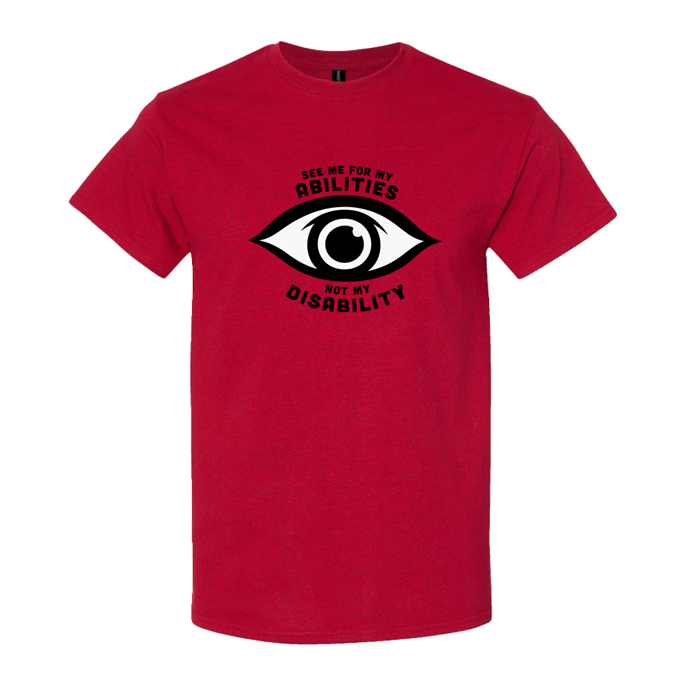 Red t-shirt featuring an eye graphic and the text “See me for my abilities, not my disability.”