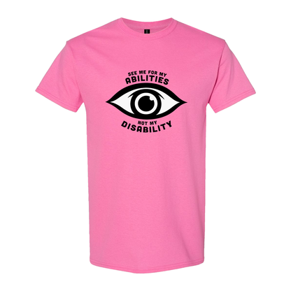 Pink t-shirt featuring an eye graphic and the text “See me for my abilities, not my disability.”
